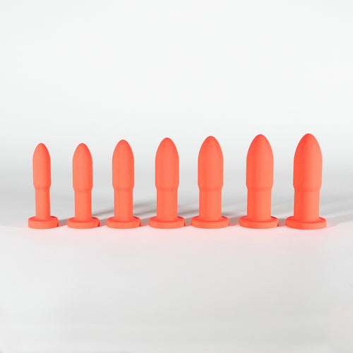 Slo.Mo anal training kit in Blush: seven silicone butt plugs in a row, from size 1 to size 7